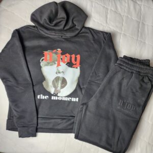 Dark gray hoodie and sweatpants with graphic text and image on the hoodie.