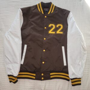 Brown varsity jacket with white sleeves and yellow number 22.